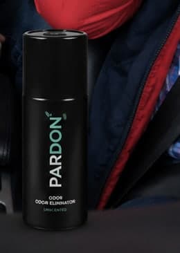 Bottle of Pardon tucked into a car console